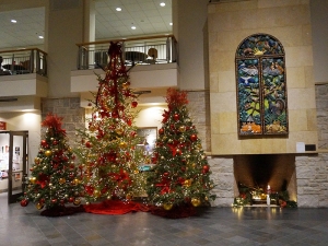 Christmas trees and decorations in the lobby of Buntrock Commons.